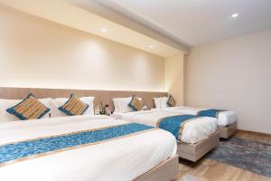 Letto o letti in una camera di Shuvatara Suites & Spa, Thamel