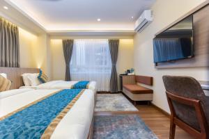 Letto o letti in una camera di Shuvatara Suites & Spa, Thamel
