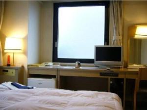 TV a/nebo společenská místnost v ubytování Silk Hotel