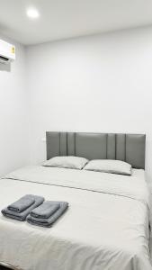 Katil atau katil-katil dalam bilik di S9 Hotel Samutsakhon เอสไนน์โฮเทล สมุทรสาคร