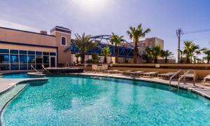 a large swimming pool in front of a building at Crystal Tower 409 in Gulf Shores