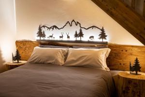 Postel nebo postele na pokoji v ubytování Agriturismo La Dolza
