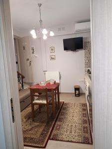 TV a/nebo společenská místnost v ubytování Villasabella 2 Apartments