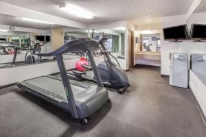 a room with a gym with a treadmill at Days Inn by Wyndham El Reno in El Reno