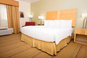 Postelja oz. postelje v sobi nastanitve Radisson Hotel Yuma