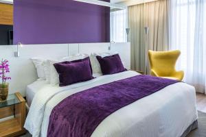 Postel nebo postele na pokoji v ubytování Radisson Hotel Curitiba
