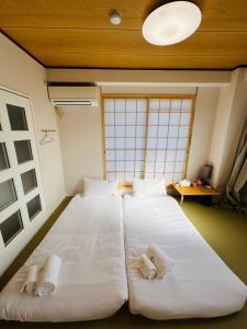 Letto o letti in una camera di 德川 CU Host CASA