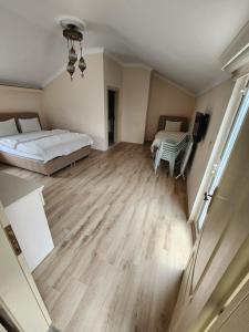 Ένα ή περισσότερα κρεβάτια σε δωμάτιο στο esa apartman 4