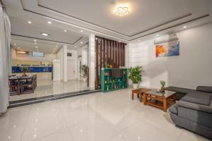 Posezení v ubytování Nhat Villa 5br full AC near MY KHUE BEACH Western Town + 36 fotografií