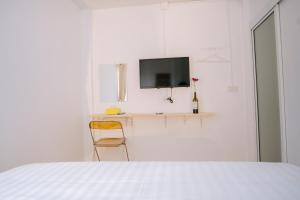 TV a/nebo společenská místnost v ubytování B&B Chiangrai