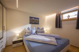 Postel nebo postele na pokoji v ubytování Appartement Heidegger