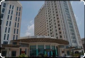a large building with two large tall buildings at Kelantan Trade Centre in Kota Bharu