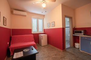 Kuchyň nebo kuchyňský kout v ubytování Apartment Pero