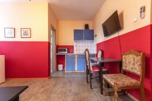 Kuchyň nebo kuchyňský kout v ubytování Apartment Pero