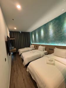 Postel nebo postele na pokoji v ubytování Red's Hotel + 47 fotografií