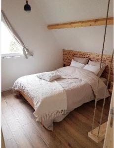 Postel nebo postele na pokoji v ubytování L'esprit cabane