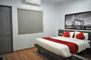 Annandam Inn(Hotel Anand)客房内的一张或多张床位