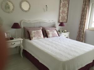Postel nebo postele na pokoji v ubytování Vilamoura Villa Alegria