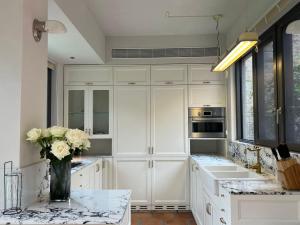 Virtuve vai virtuves zona naktsmītnē Xiamen Gulangyu Bishan Residence