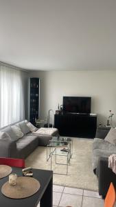 Posezení v ubytování Zimmer mit privatem Badezimmer in guter Lage