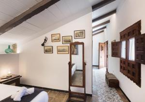 Postel nebo postele na pokoji v ubytování Art Boutique La Casona de las Flores