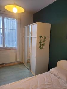 Postel nebo postele na pokoji v ubytování Le porquerolle