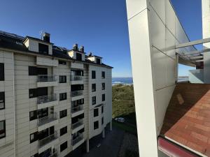 a view from the balcony of a building at Salinas Soja Beach, Frente a la Playa VUT-3778-AS in Salinas