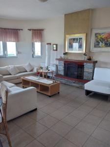 Χώρος καθιστικού στο Villa Jenny