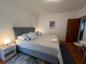 Postel nebo postele na pokoji v ubytování Accomodation Mirjana Rooms