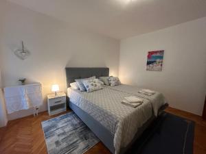 Postel nebo postele na pokoji v ubytování Accomodation Mirjana Rooms