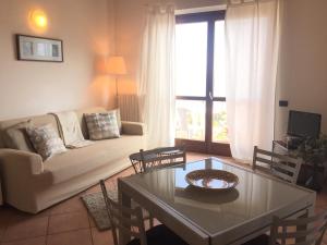 A seating area at Appartamento Francesco - Theater Home