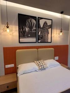 Ένα ή περισσότερα κρεβάτια σε δωμάτιο στο Terra Private Studio with Balcony WiFi Ac Smart TV Kitchenette Washing Machine