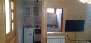 Kuchyň nebo kuchyňský kout v ubytování Brvnara 23 minimum 2 noći