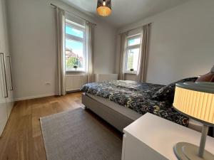 Katil atau katil-katil dalam bilik di Luxury Apartment Privoz