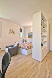 Posezení v ubytování Appartamento Promontorio - Theater Home