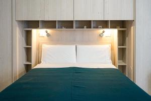 Postel nebo postele na pokoji v ubytování Riol Home + 9 fotografií