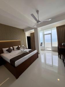 Katil atau katil-katil dalam bilik di Sevonra Beach Resort