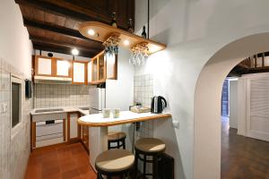 Kuchyň nebo kuchyňský kout v ubytování Il nido di Elisa