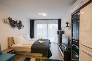 En eller flere senge i et værelse på MyFlat Coral Suite + 37 billeder