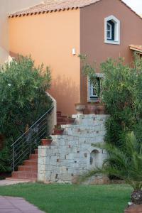 a set of stairs in front of a house at Dia Apartments in Hersonissos