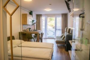 Voodi või voodid majutusasutuse Appartement Alpenrauschen toas