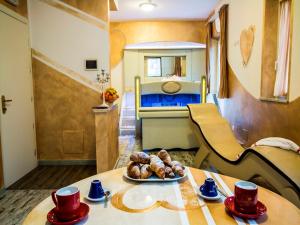 Postel nebo postele na pokoji v ubytování Hotel Butterfly