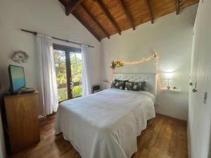 Postel nebo postele na pokoji v ubytování CASADELGOLF Villa Gesell