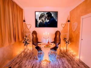TV a/nebo společenská místnost v ubytování Hotel Butterfly