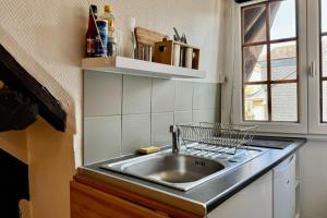 Kuchyň nebo kuchyňský kout v ubytování Vera Studio Confortable sous les combles !