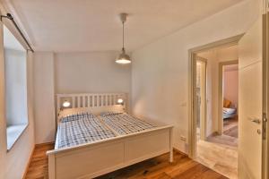 Ένα ή περισσότερα κρεβάτια σε δωμάτιο στο Casa Greta - Theater Home