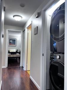 a laundry room with a washer and dryer in it at Pet Friendly Ranch Home 30 mins from O'Hare in Schaumburg