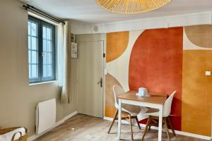 Posezení v ubytování Julia un véritable cocon au coeur de la ville