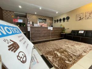 a store with a noogie sign in a room at Parc Hotel Pelangi Damansara in Kuala Lumpur