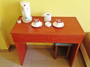 Příslušenství pro přípravu čaje a kávy v ubytování Sakiza View Mersing